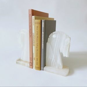 Carved stone horse head bookends